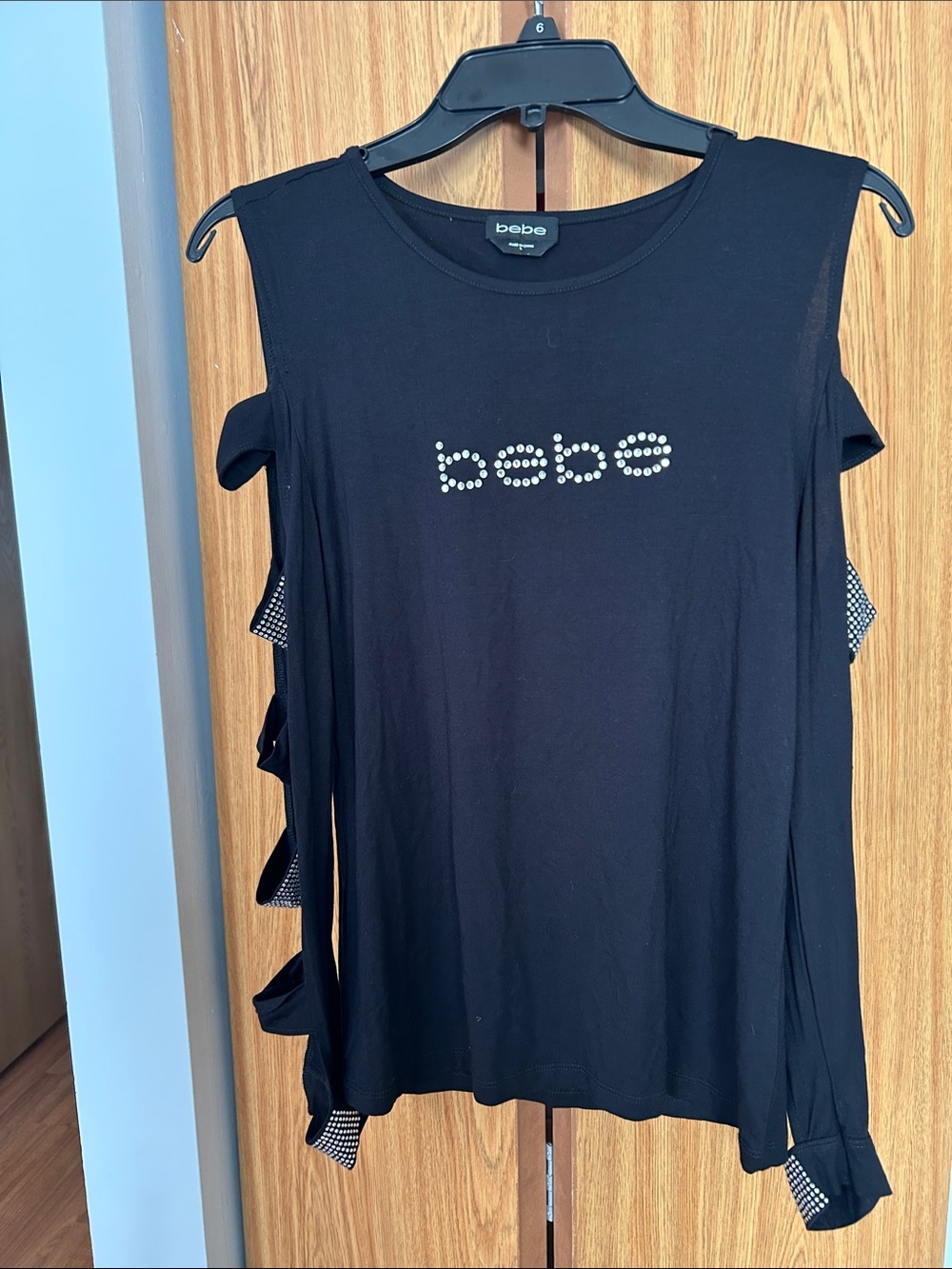 bebe Black Short Sleeve Tee with Rhinestone Logo and Side Cutouts